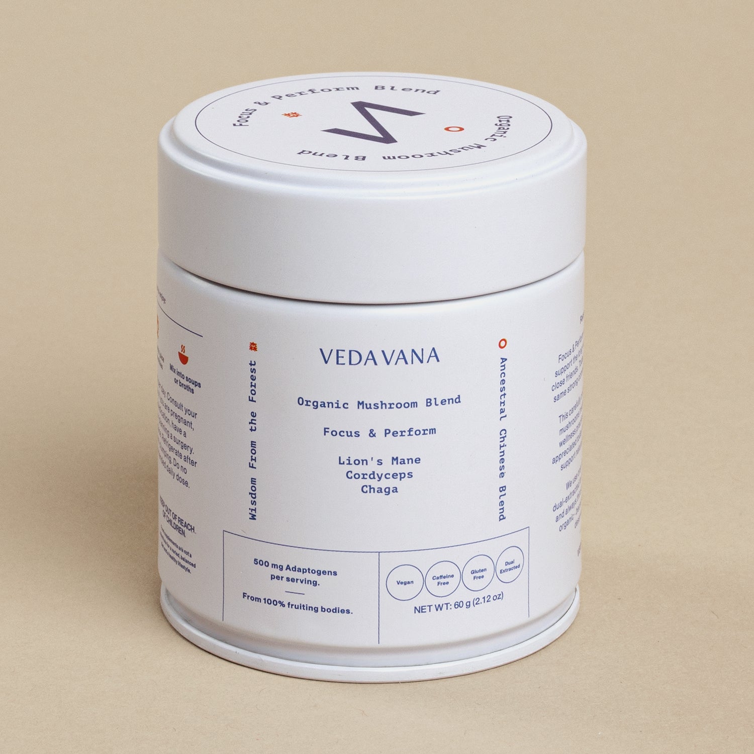 Close-up of Vedavana organic mushroom powder blend for focus and energy on beige background