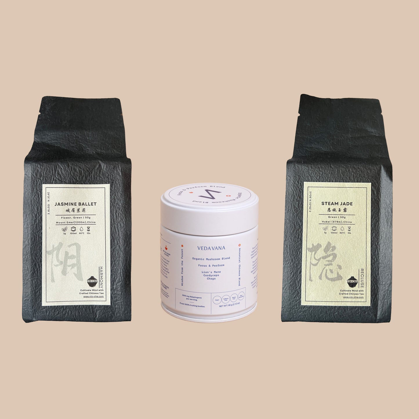 The Seasonal Support Kit with Jasmine Ballet tea, Steam Jade tea, and the Veda Vana Focus & Perform mushroom blend arranged on a beige background.